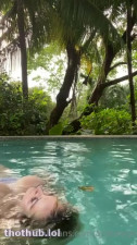 Allisonnyc floating in pool