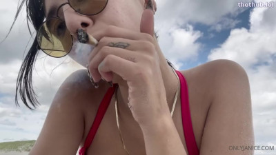 janice smoking on the beach