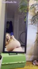 C@rly Gråc£ nude in front of a mirror