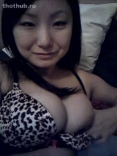 Here is Minnie Suh pulling out a nipple from her bra